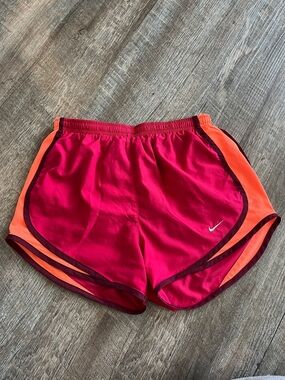 Nike Women’s Pink Running Shorts with Orange Side Panels